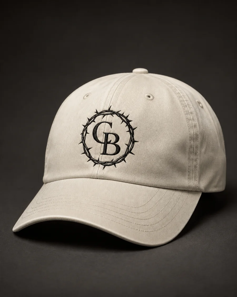 The Thorn Crest cap in Bone with the embroidered CB monogram.